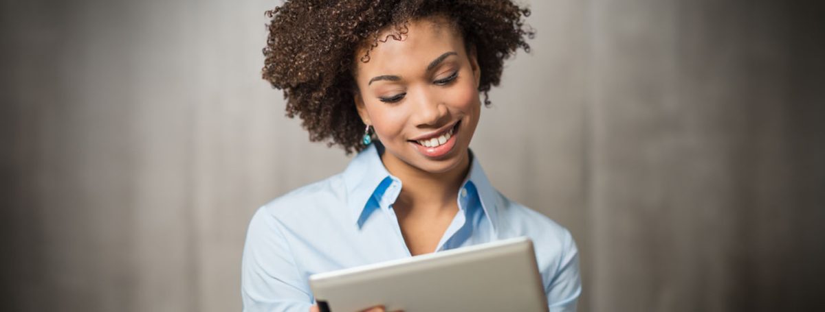 Portrait of a Successful Business woman Using Digital Tablet